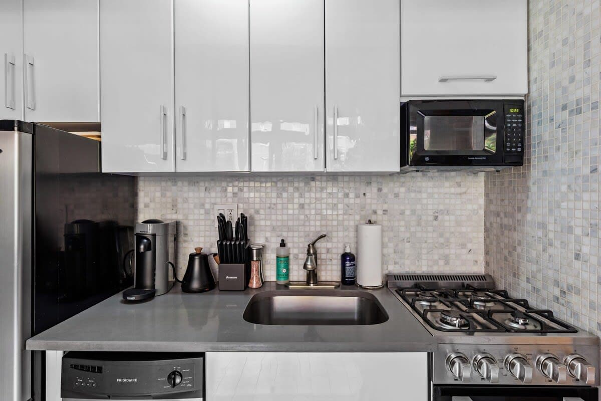 Charles Court II | West Village | Renovated Loft w/ Street Views photo 11