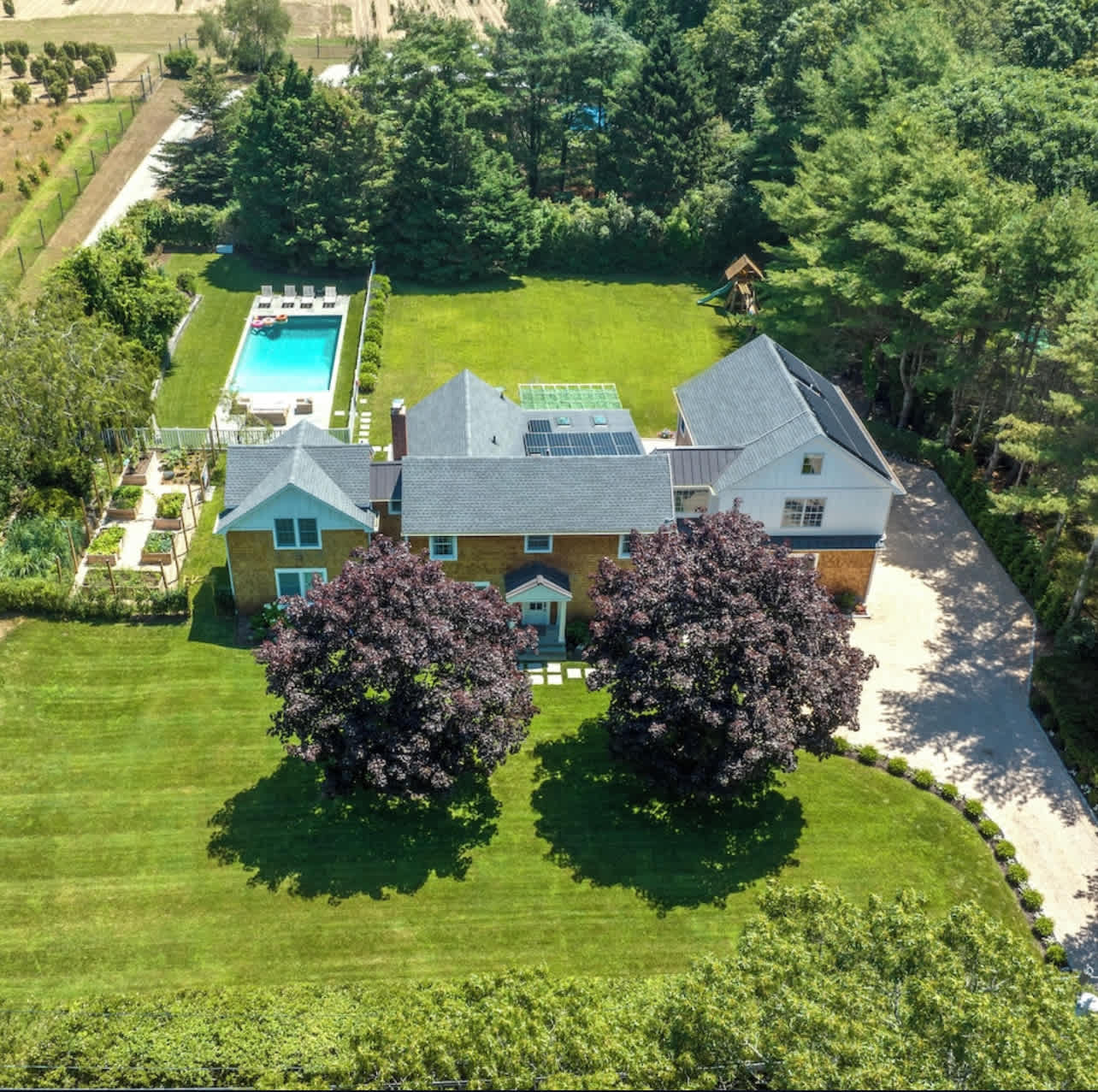 Seven Ponds Villa | Water Mill | Home w/ Heated Pool, Gym & Outdoor Spaces photo 9