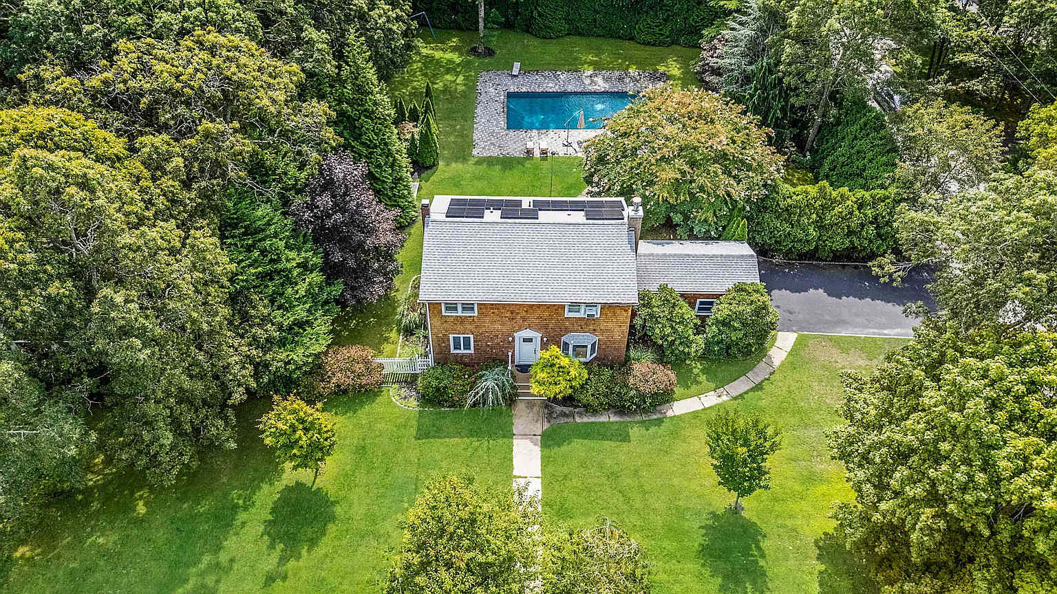 Pinetree Retreat | East Quogue | Charming Home with Heated Pool main photo