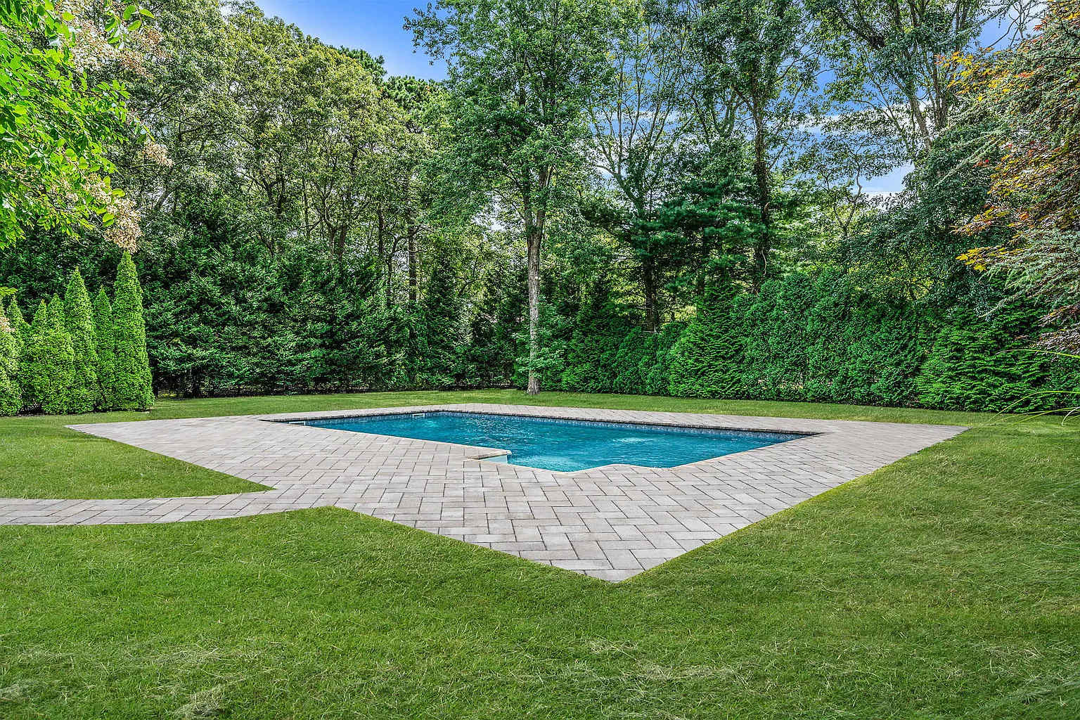 Pinetree Retreat | East Quogue | Charming Home with Heated Pool photo 5