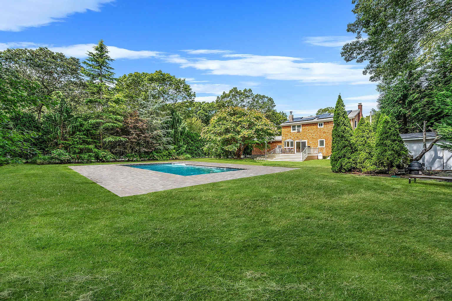 Pinetree Retreat | East Quogue | Charming Home with Heated Pool photo 26