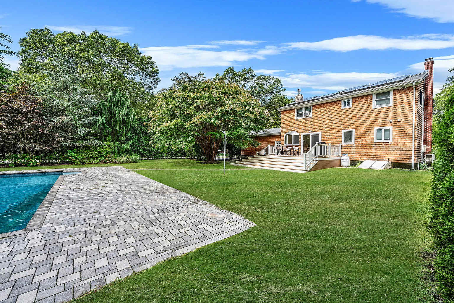 Pinetree Retreat | East Quogue | Charming Home with Heated Pool photo 27