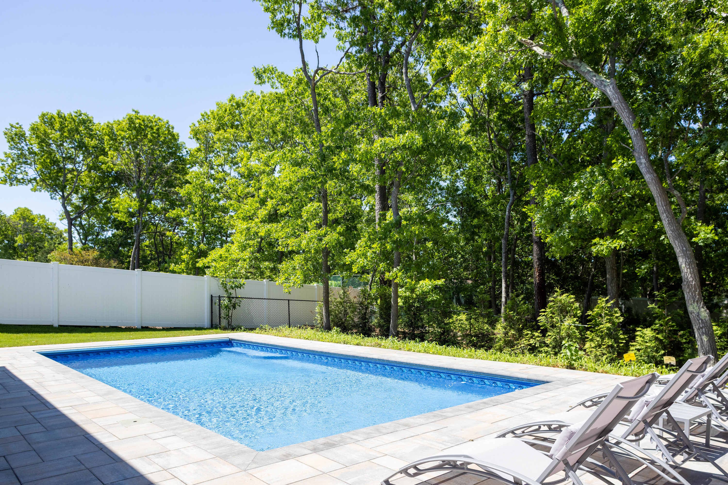 Greenway Court | Hampton Bays | Home with Heated Pool & BBQ photo 2