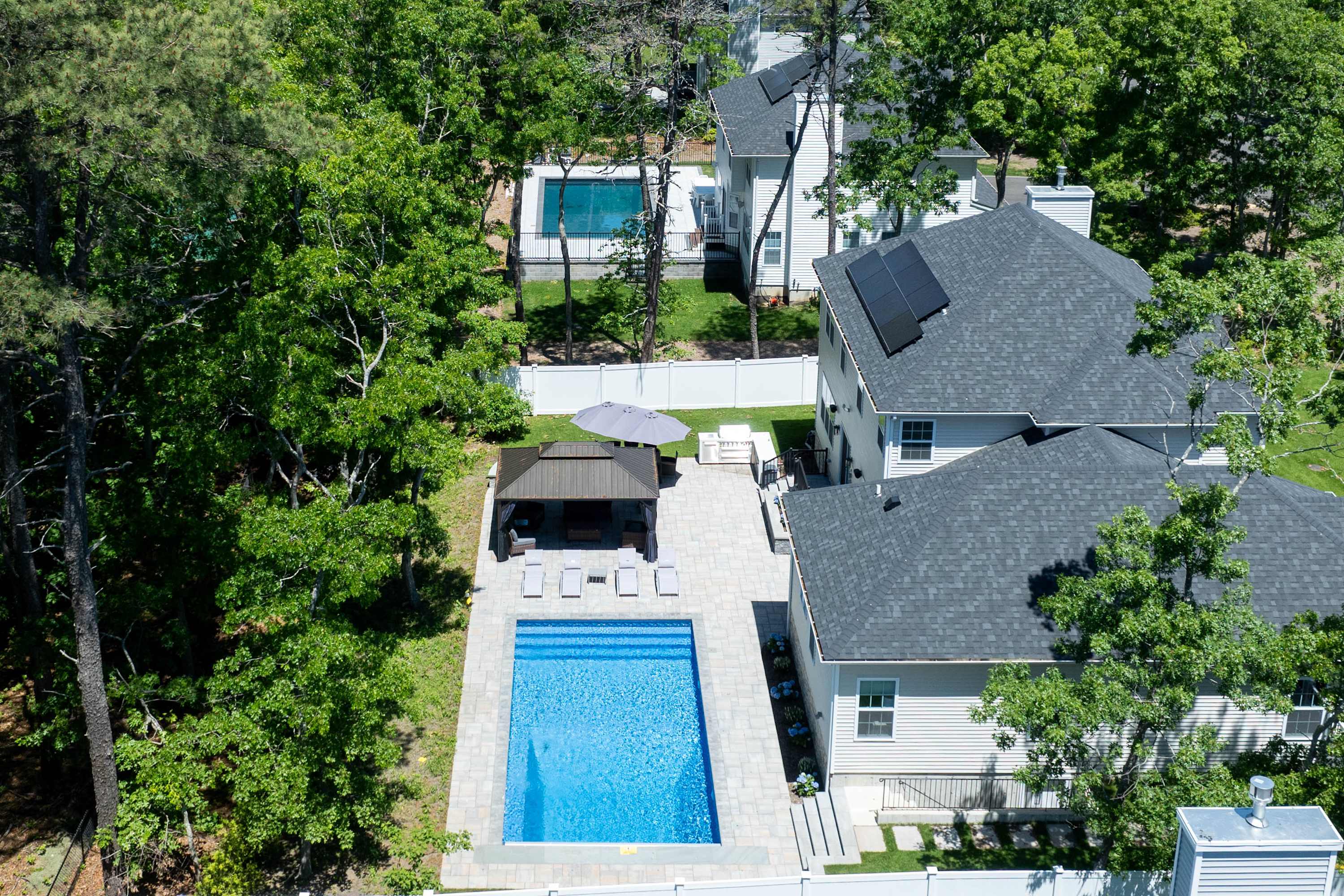 Greenway Court | Hampton Bays | Home with Heated Pool & BBQ photo 2