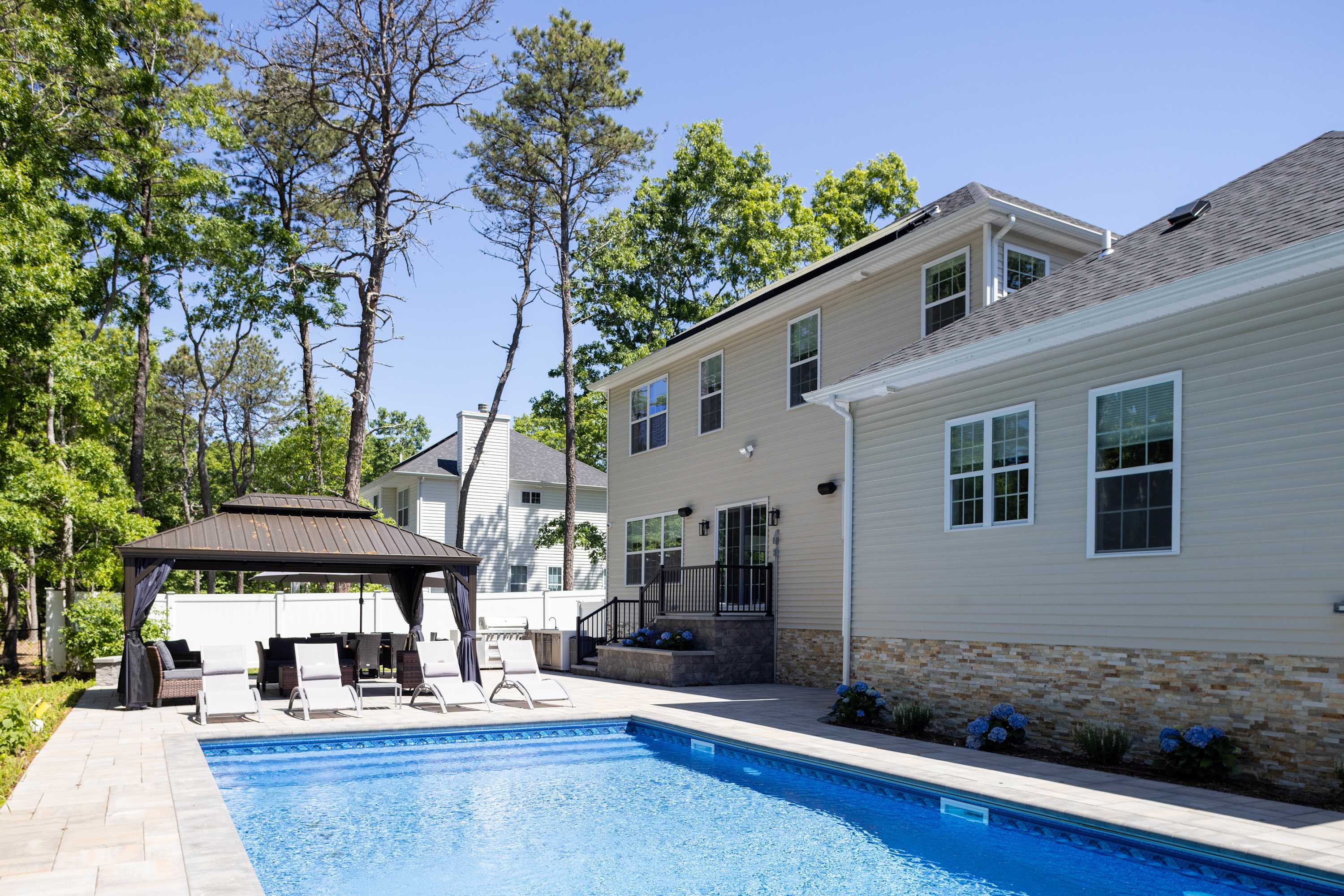 Greenway Court | Hampton Bays | Home with Heated Pool & BBQ photo 18
