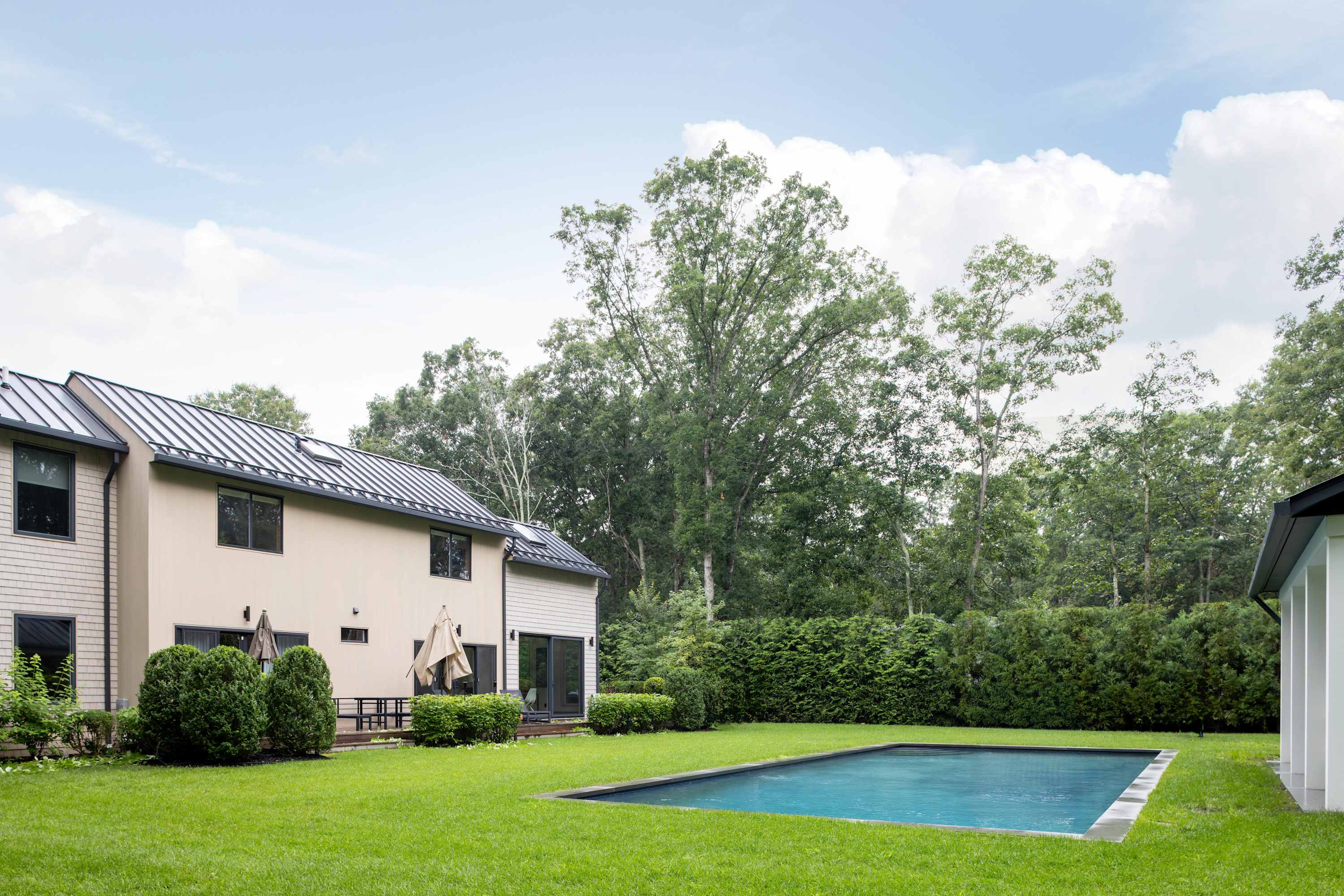 The Hillside | Contemporary Sag Harbor Retreat with Heated Pool & Designer Pool House main photo