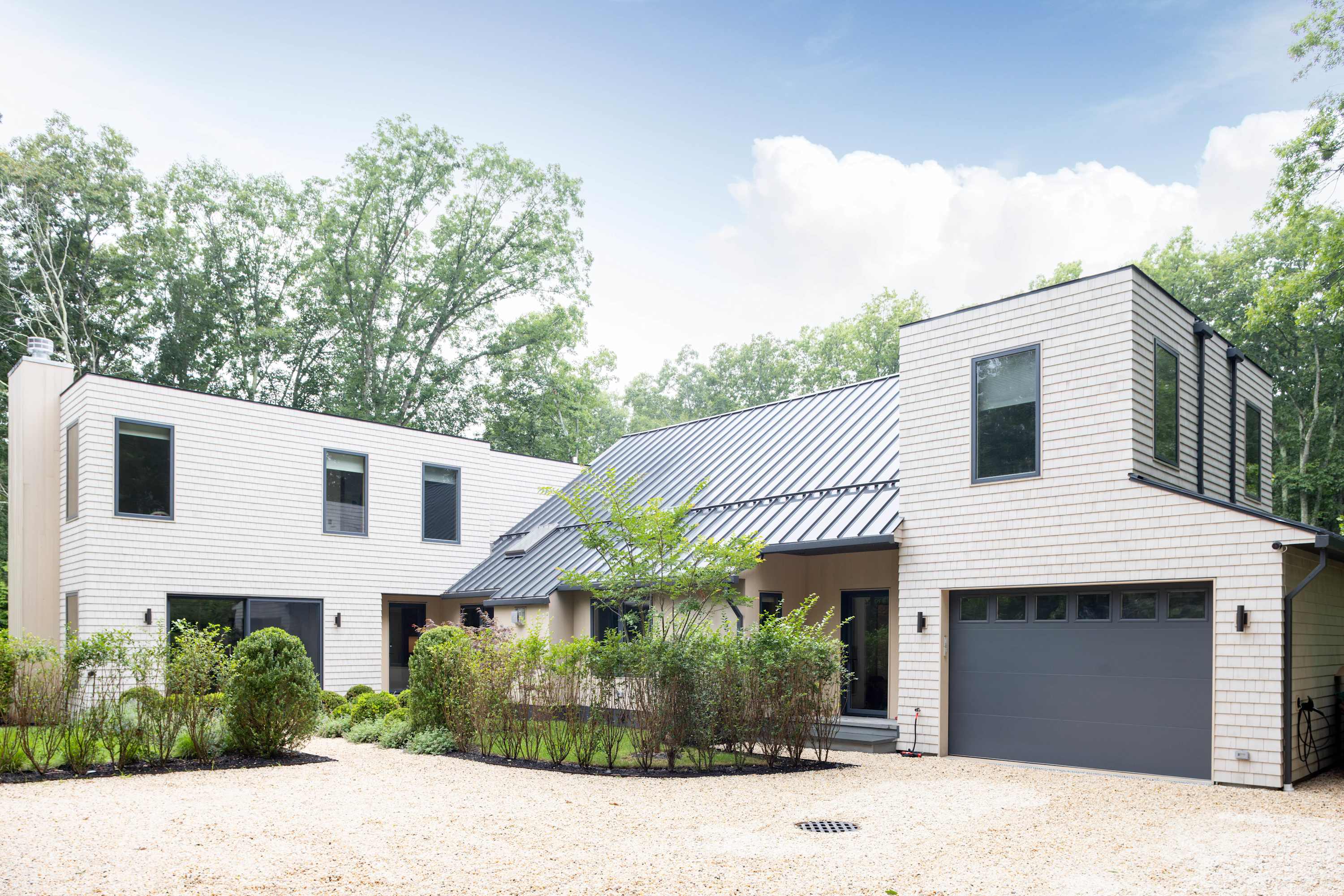 The Hillside | Contemporary Sag Harbor Retreat with Heated Pool & Designer Pool House photo 2
