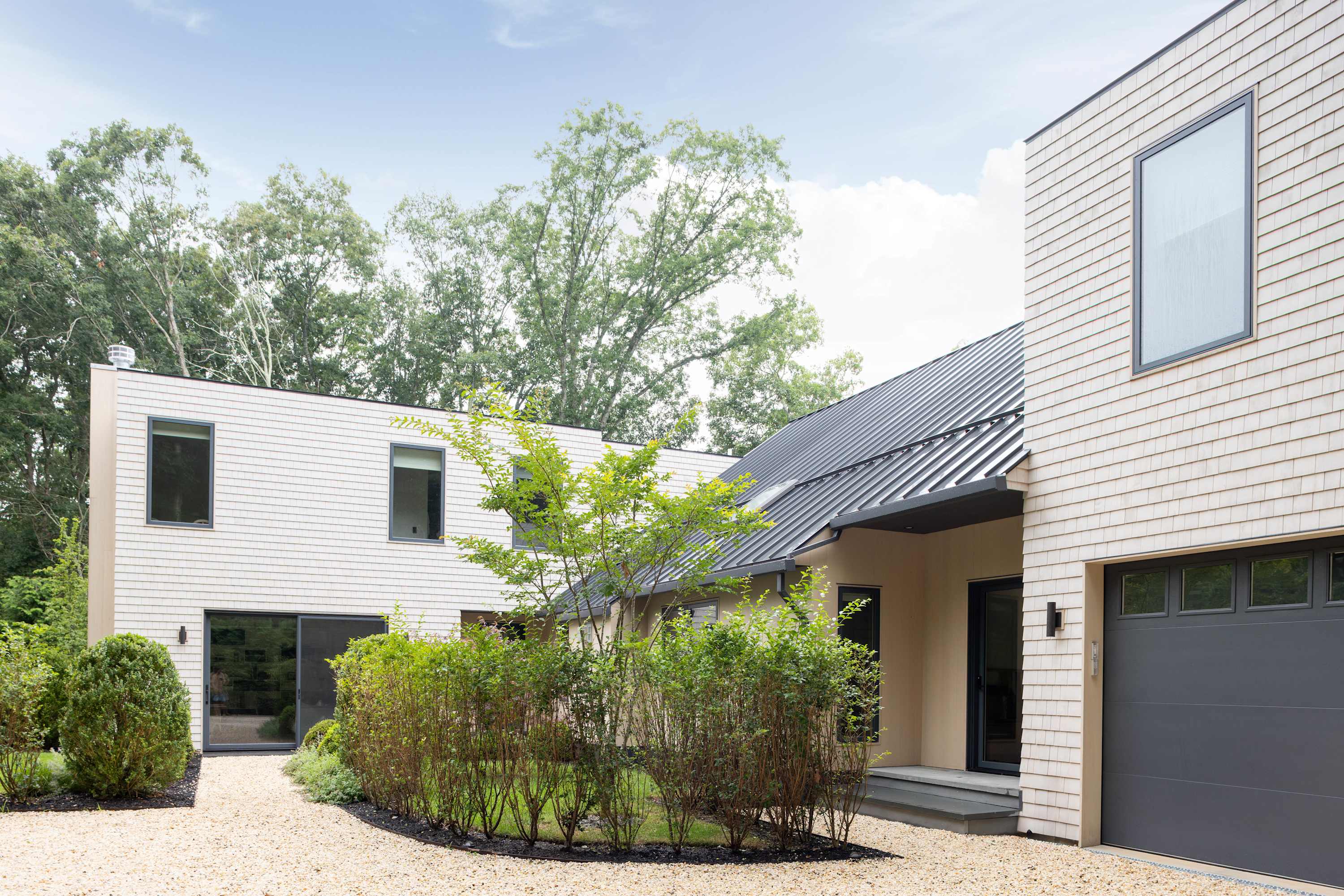 The Hillside | Contemporary Sag Harbor Retreat with Heated Pool & Designer Pool House photo 3