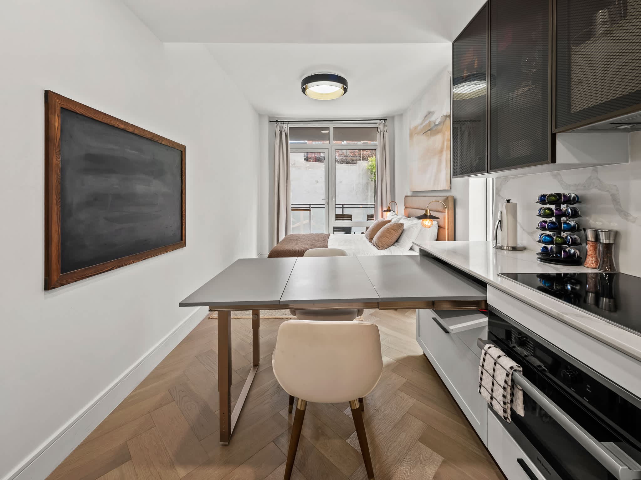Sunshine Cottage | East Village | Cozy Apt w/ Balcony & Gym photo 10