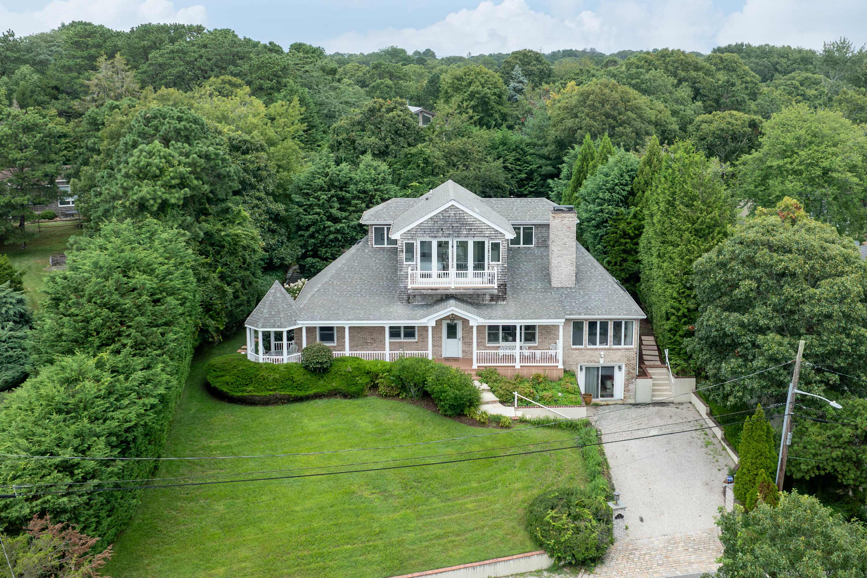 Highview Villa | Hampton Bays | Home with Heated Pool and Bay Views photo 2