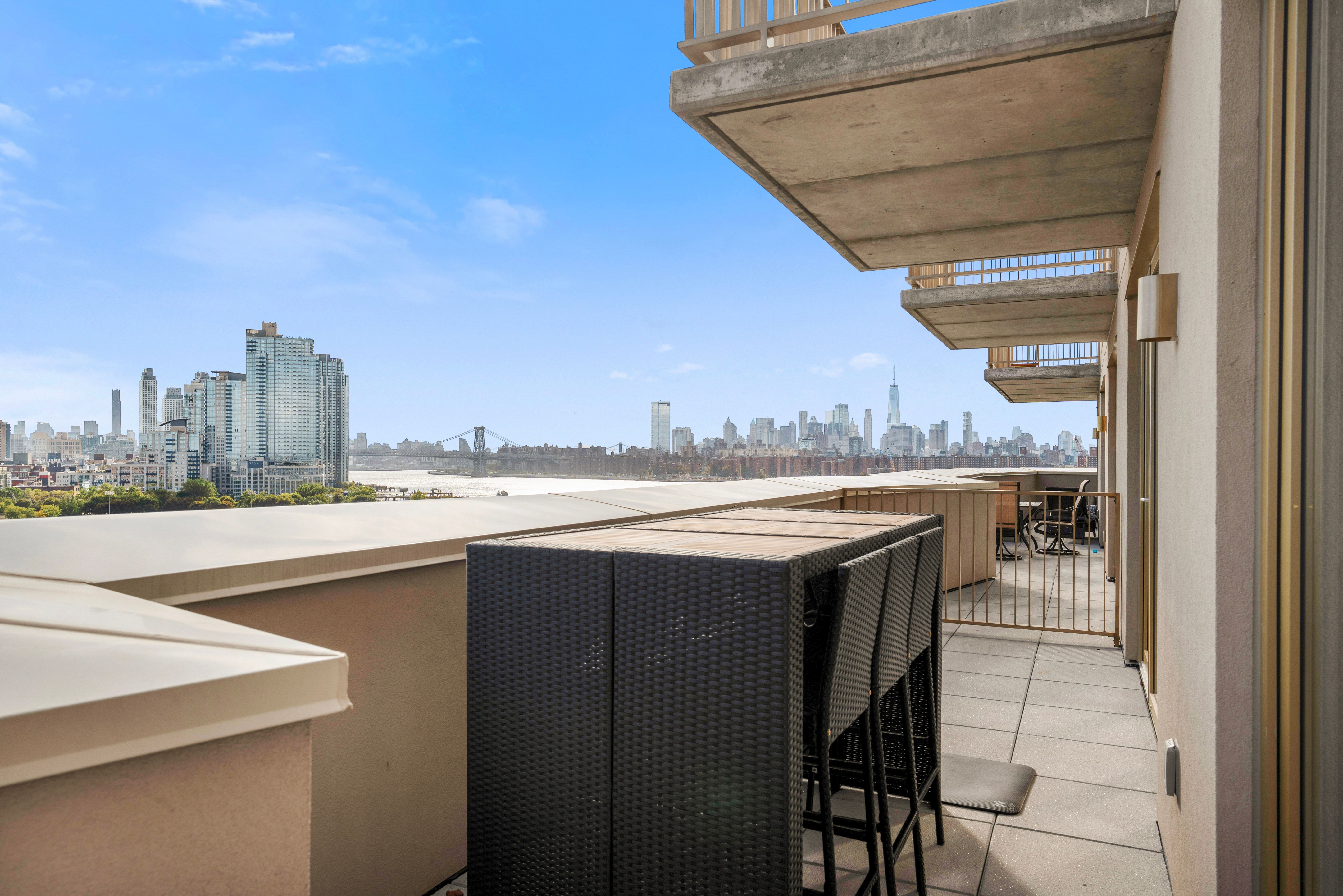 Seren 1006 | Greenpoint | Penthouse w/ Private Deck & River Views photo 24