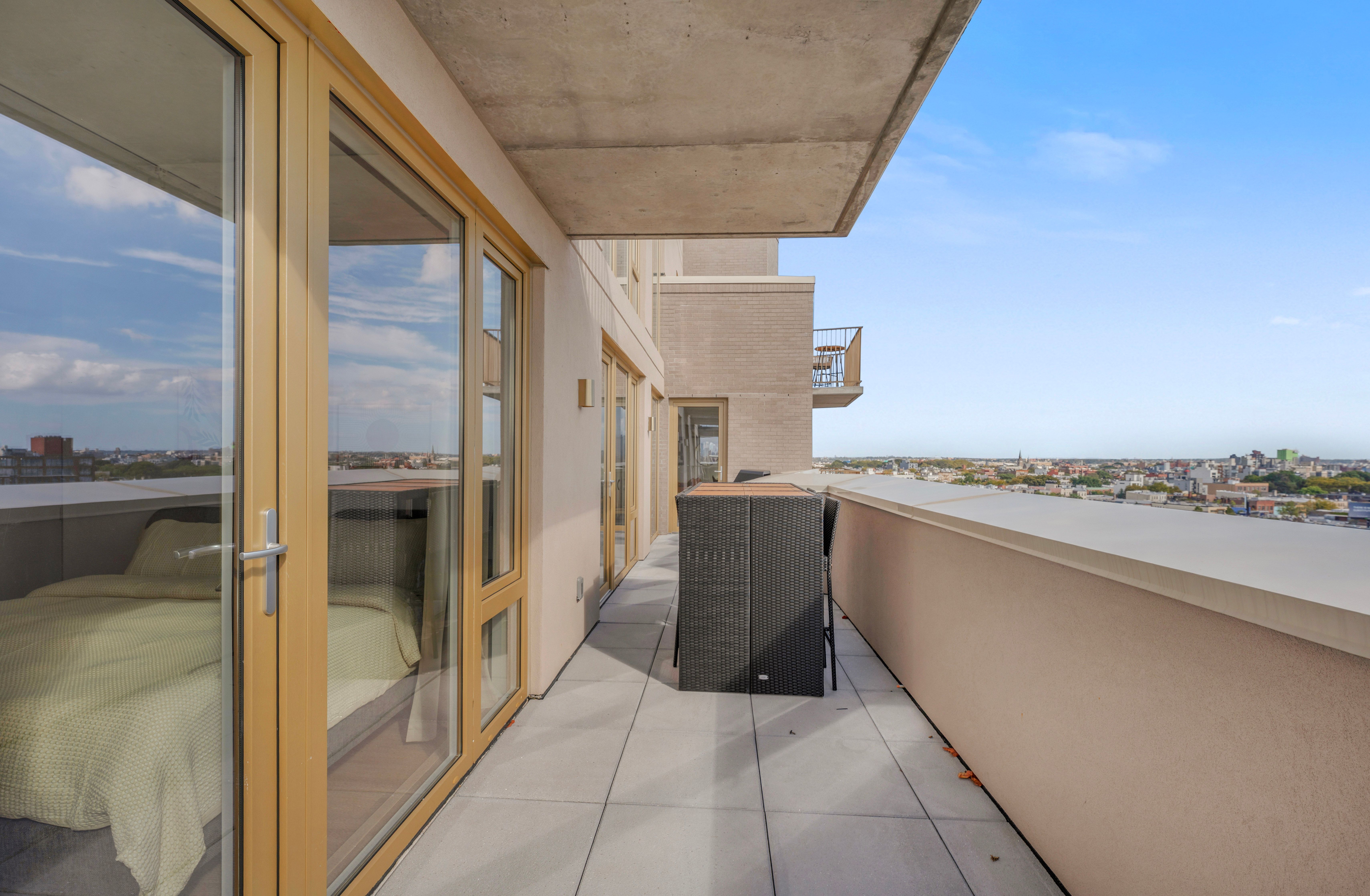 Seren 1006 | Greenpoint | Penthouse w/ Private Deck & River Views photo 23