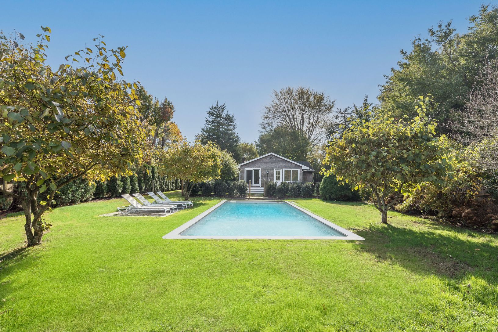 Exterior of the property with pool, Driftwood Cottage by Rove Travel | East Hamptons, NY