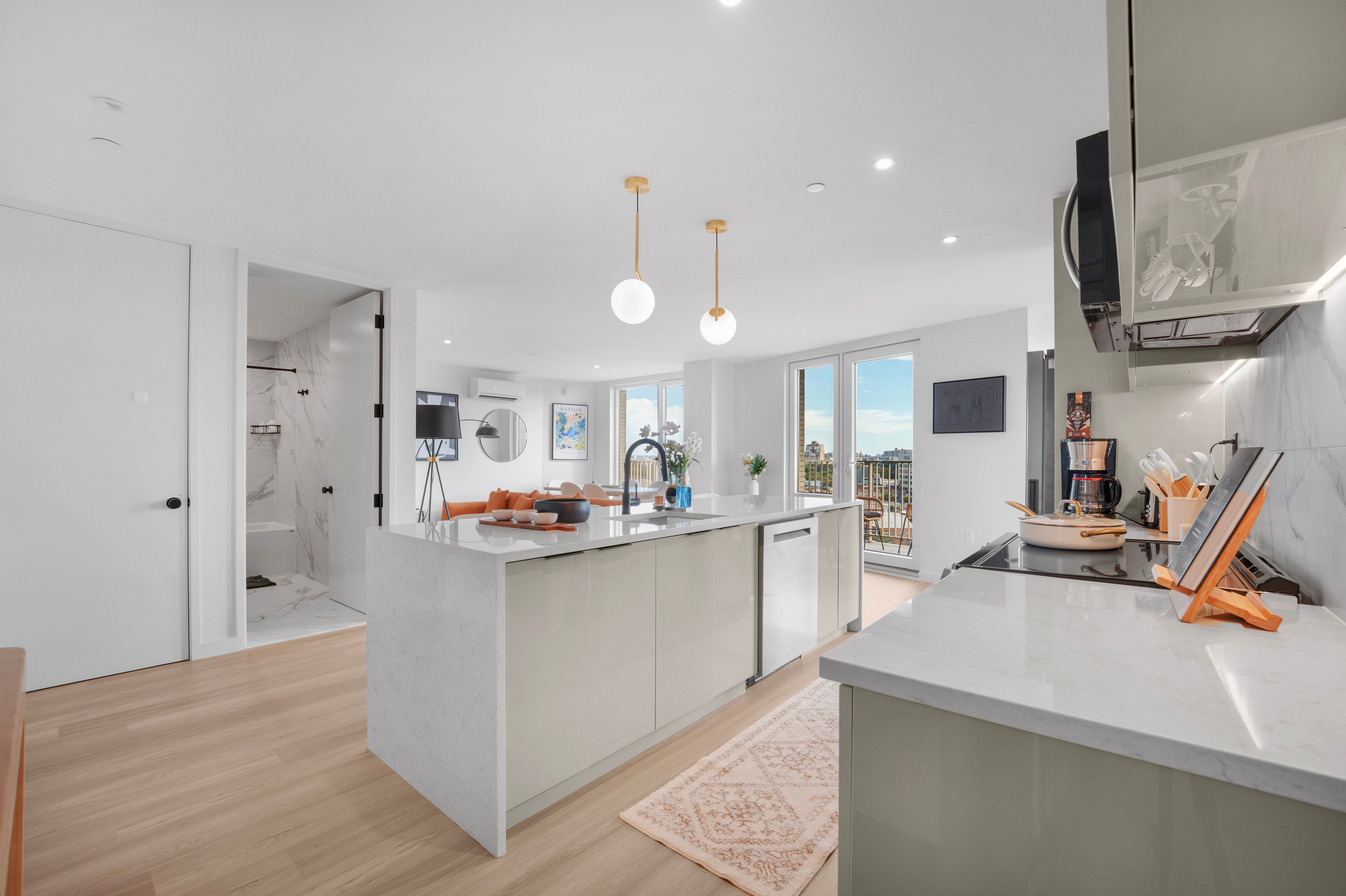 Seren 1006 | Greenpoint | Penthouse w/ Private Deck & River Views photo 6