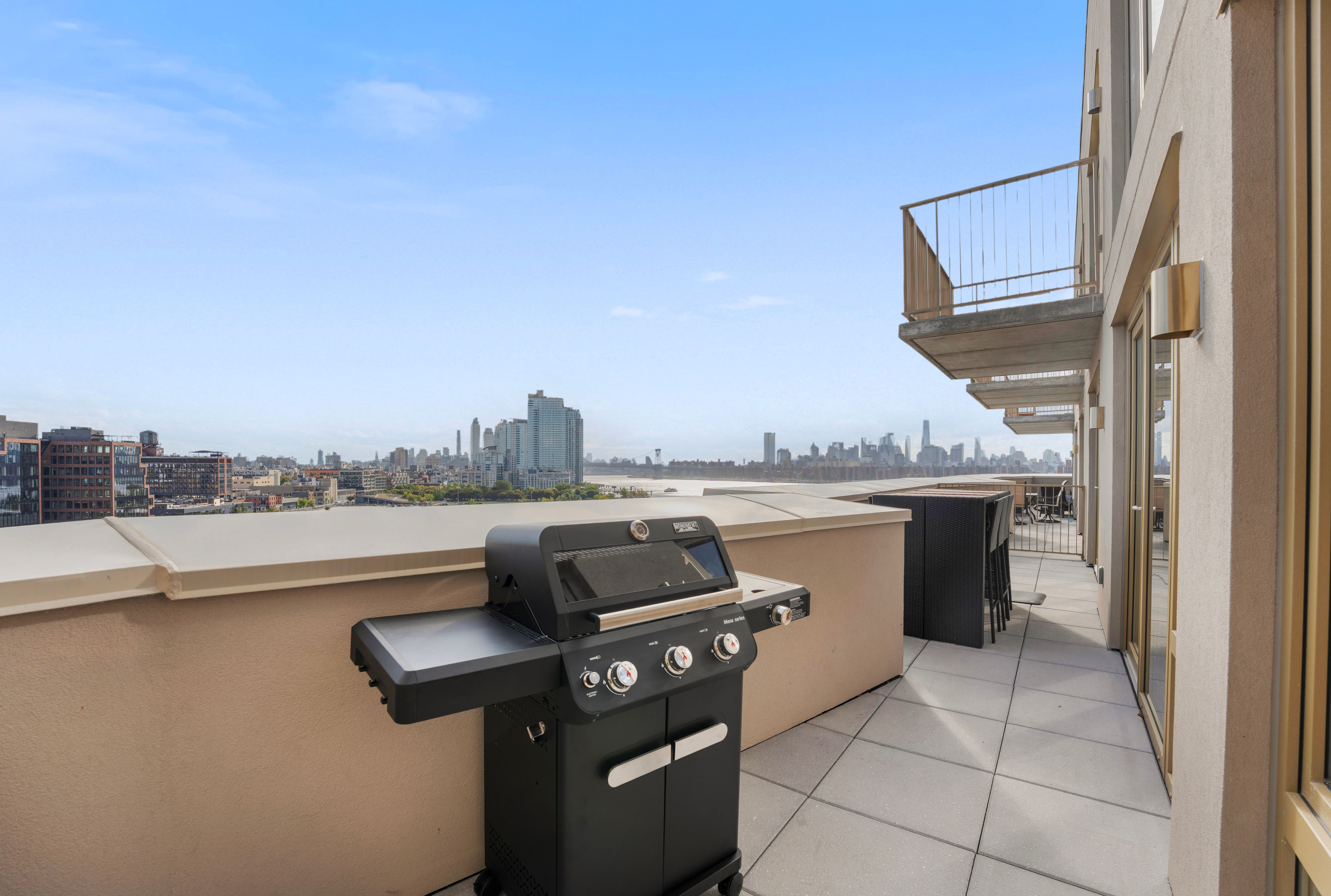 Seren 1006 | Greenpoint | Penthouse w/ Private Deck & River Views photo 22