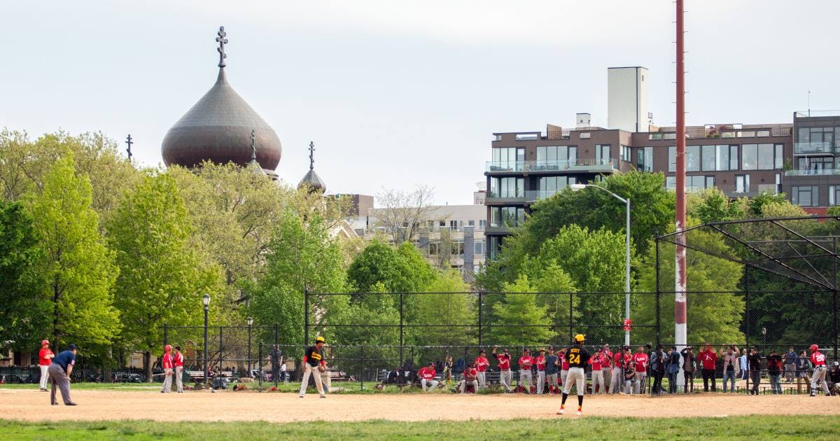 People playing baseball in McCarre­n Park in Williamsburg, Brooklyn