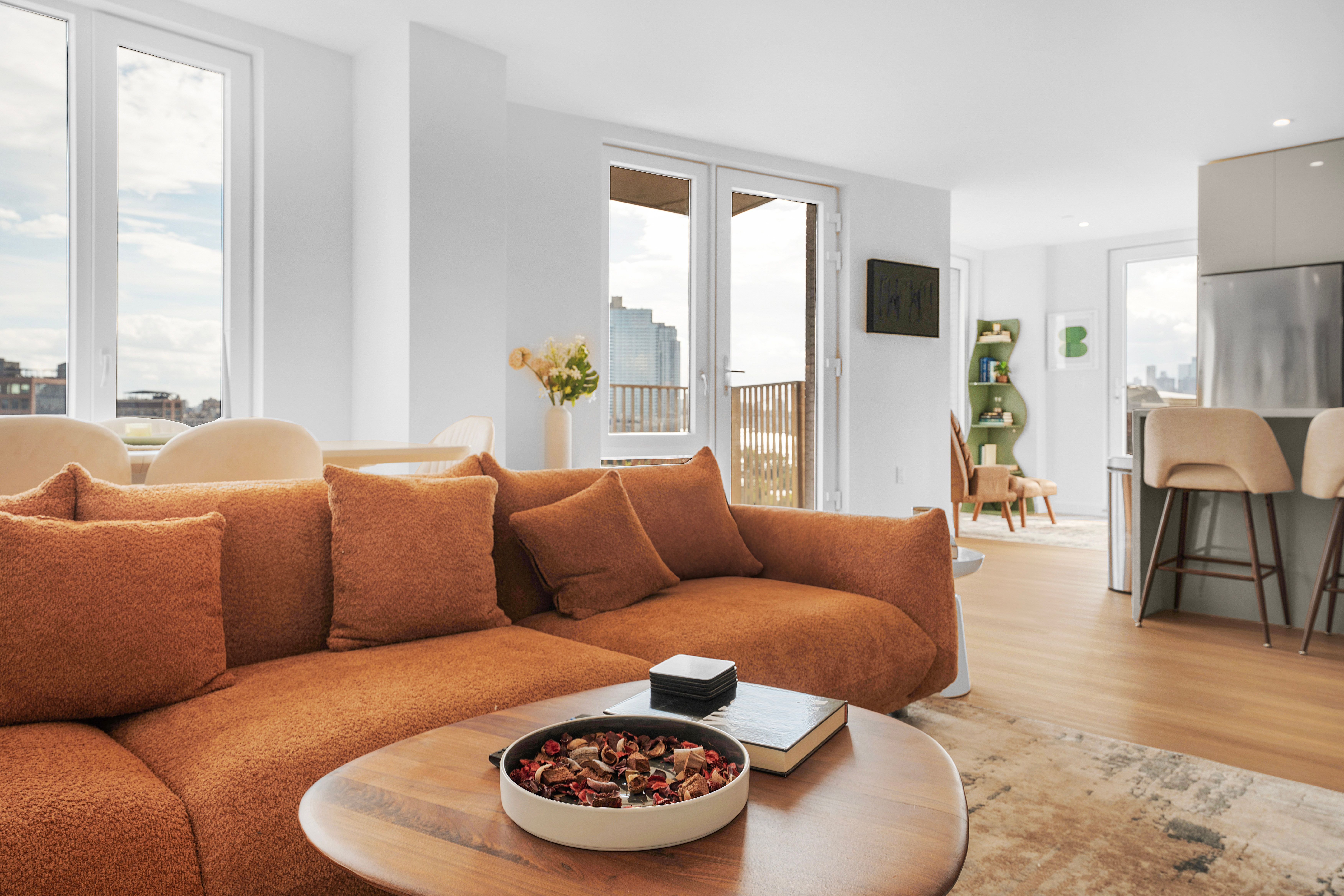 Seren 1006 | Greenpoint | Penthouse w/ Private Deck & River Views main photo