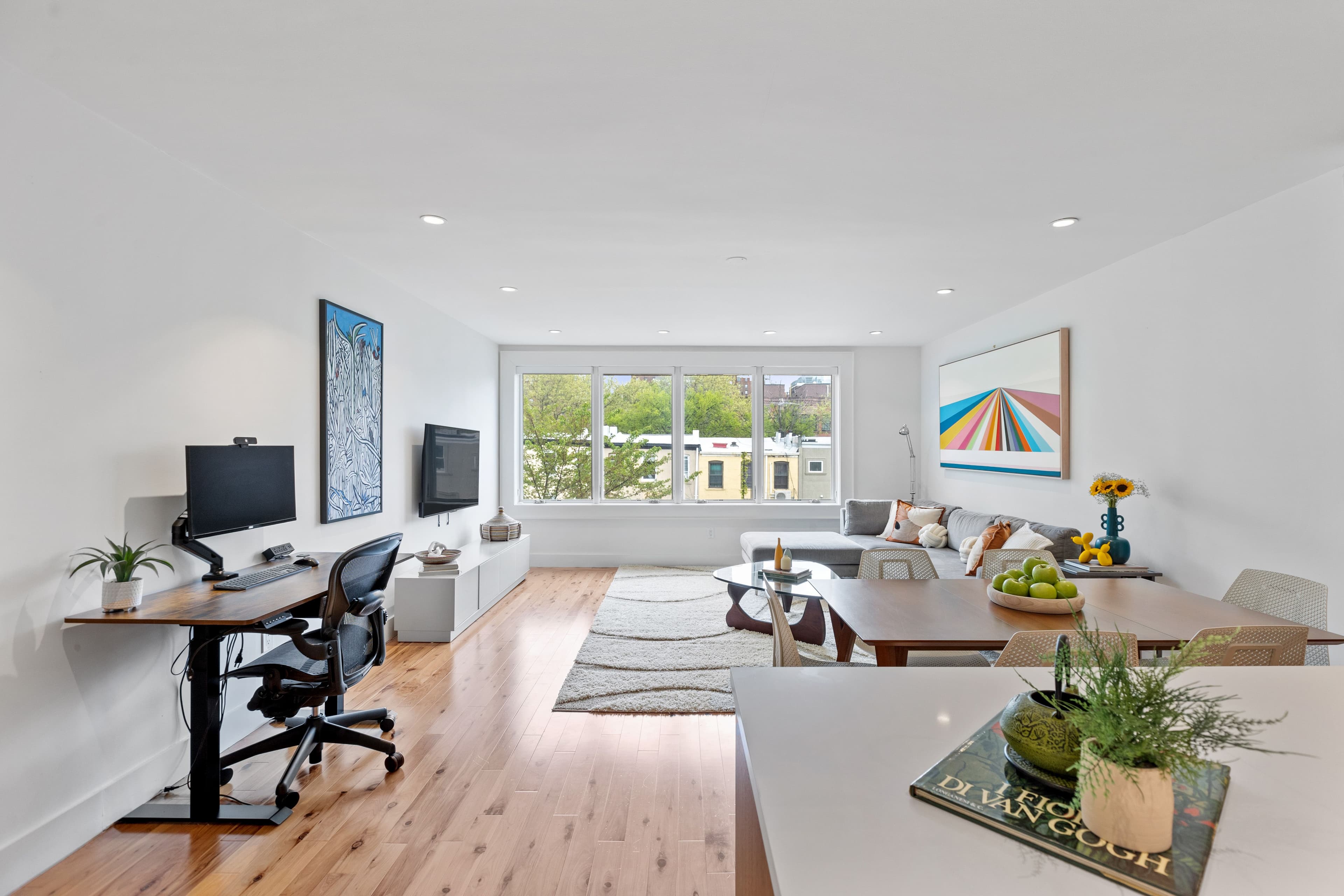 A fully furnished living room, dining and workstation area of a townhouse in Caroll Gardens, Brooklyn. Designed and managed by Rove Travel.