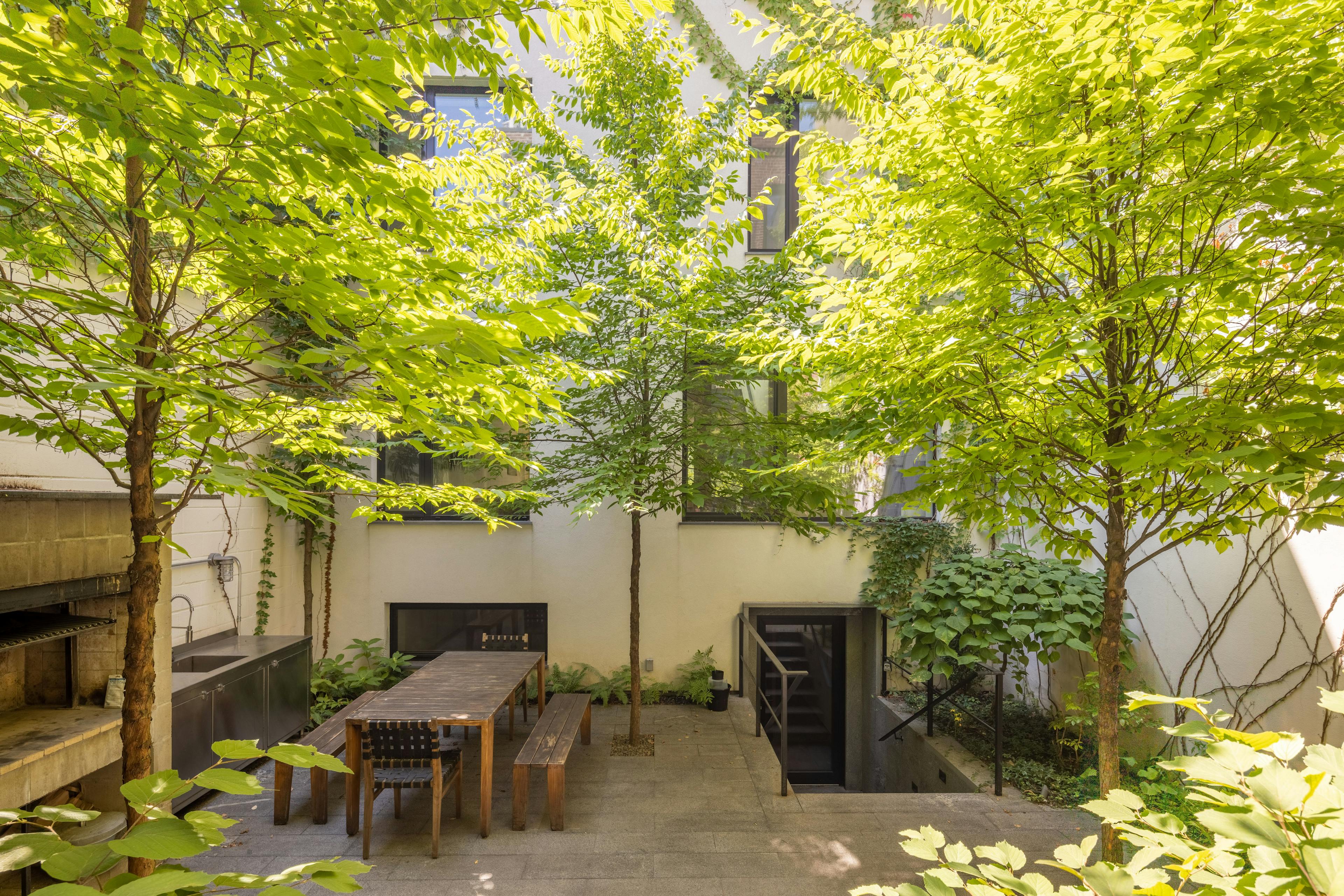 Brooklyn Townhouse Tranquil and Lush Greenery Backyard Patio with Outdoor Dining