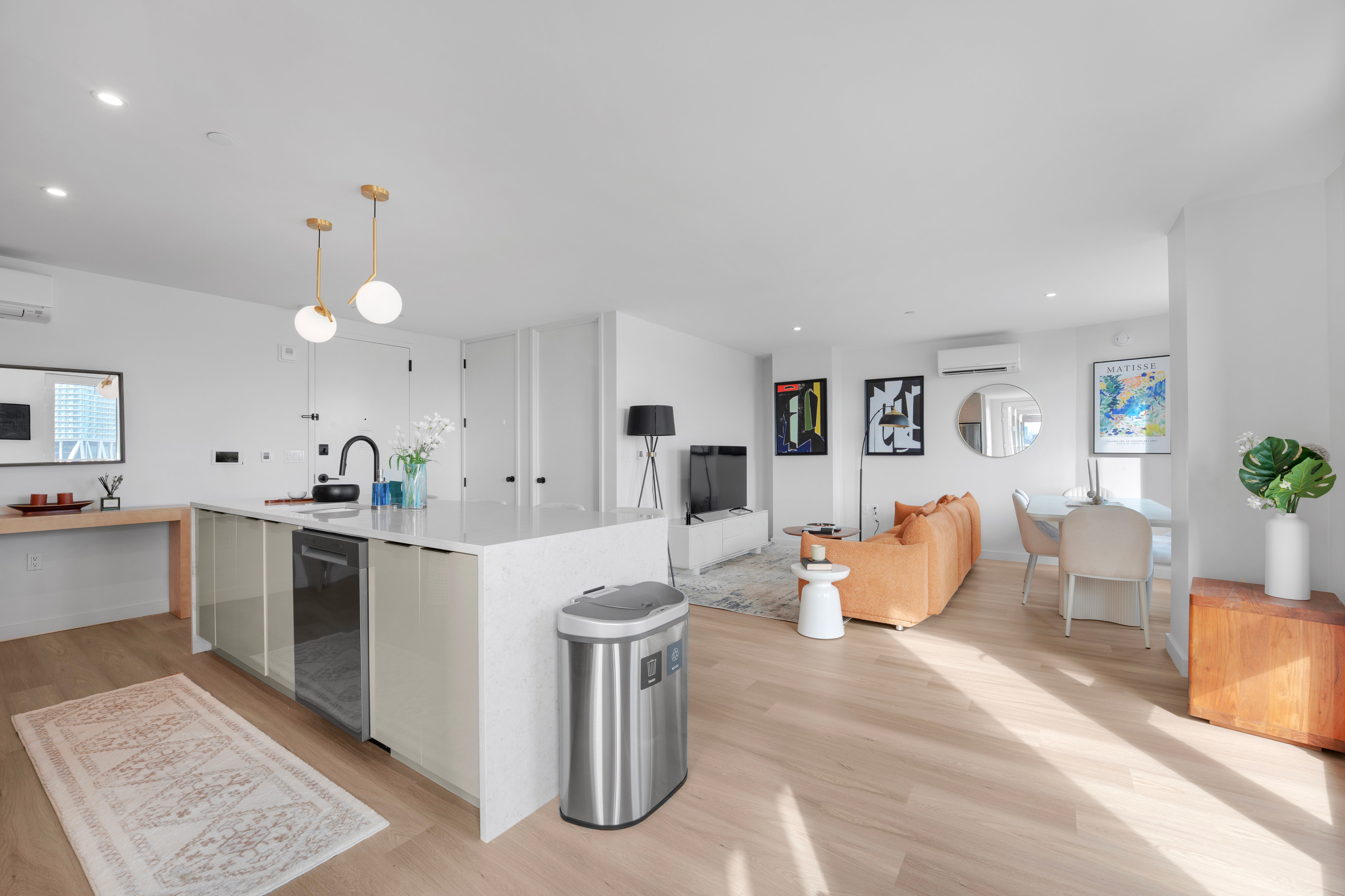 Seren 1006 | Greenpoint | Penthouse w/ Private Deck & River Views photo 12
