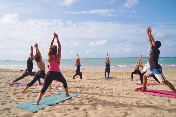 Yoga class on the beach